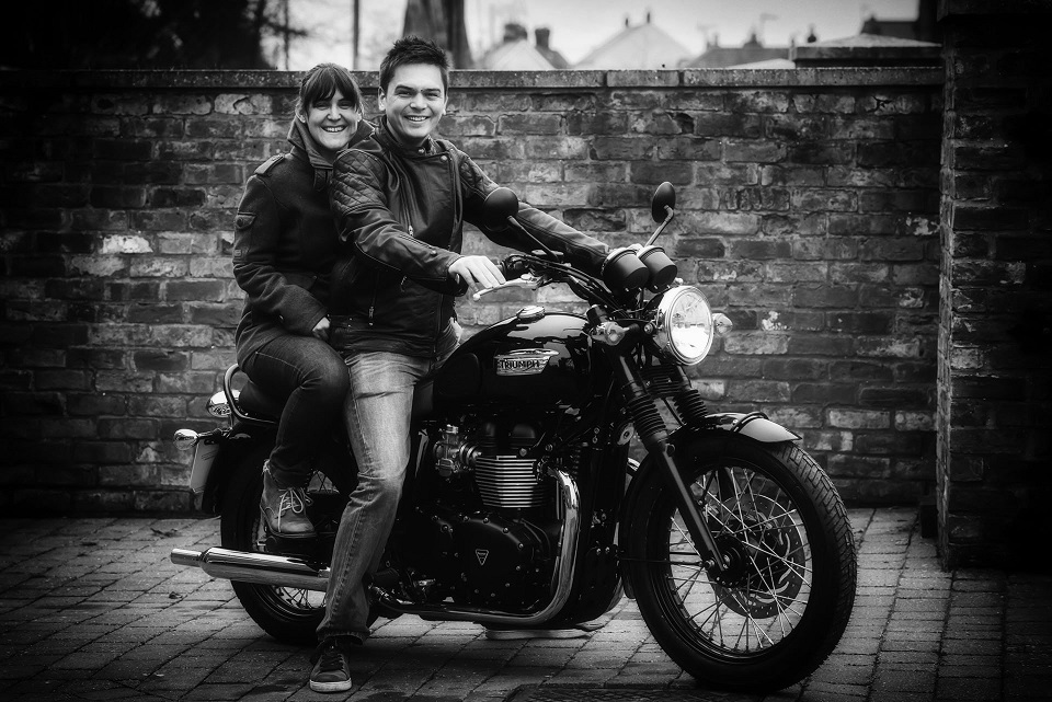 Dan and Angela riding a motorcycle